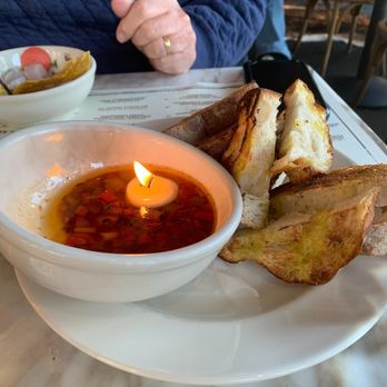 OvenBird - Beef fat candle with bread. - Tapas/Small Plates Near Me - Birmingham, Alabama