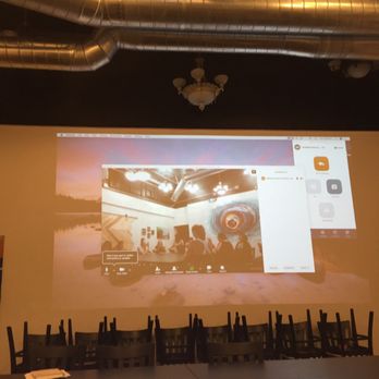 Mind & Mill - Large projector in one of the rooms. - Marketing Near Me - Riverside, California