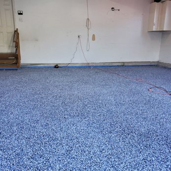 Penn-Jersey Garage Solutions - a room with a blue floor - Flooring Near Me - Lambertville, New Jersey