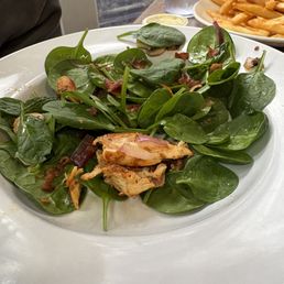 Spinach salad with chicken.
