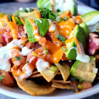 O'Brien's Pub - Ahi Nachos Crispy chips, seared ahi, salsa fresca, avocado, Big Nate sauce, wasabi aioli, scallions - Pubs Near Me - San Diego, California O'Brien's Pub - Ahi Nachos Crispy chips, seared ahi, salsa fresca, avocado, Big Nate sauce, wasabi aioli, scallions - Pubs Near Me - San Diego, California