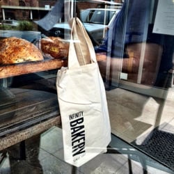 Infinity Sourdough Bakery - Signage is quite subtle ~ so look for these carry alls in the Windows.
