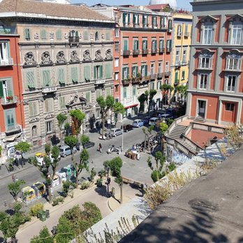 La Stanza del Gusto - The square from our host's terrace, looking down toward restaurant. - Italian Near Me - Naples, NA La Stanza del Gusto - The square from our host's terrace, looking down toward restaurant. - Italian Near Me - Naples, NA