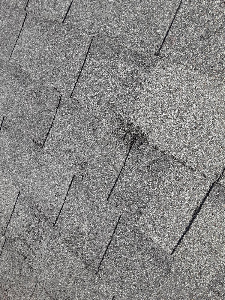 Slide of Grassi Roofing