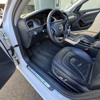 Divine Detailing - Front seat of an Audi, deep cleaned, and carpet lines - Auto Detailing Near Me
