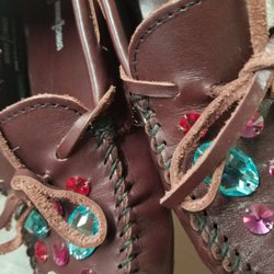 Shoe Repair - I had these moccasins where the thread was unraveling and loosening up! He was able to fix them, they're like brand new!