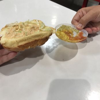 Costco Wholesale - bottom of the cheeseburger bun at the food court. You'll see, I've added the lid to a soda for comparison. - Wholesale Stores Near Me - Brentwood, Tennessee