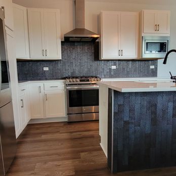 Precisionlux Home Remodeling - Kitchen island and backsplash - General Contractors Near Me