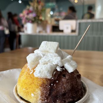 Ululani's - Habanero mango and lemon peel with added li hing powder, mochi, and mango sorbet ice cream. - Shaved Ice Near Me - Chula Vista, California