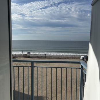 Misquamicut Beach Front Inn - View from the door of the balcony on a Monday when it was significantly less busy - Hotels Near Me - Westerly, Rhode Island Misquamicut Beach Front Inn - View from the door of the balcony on a Monday when it was significantly less busy - Hotels Near Me - Westerly, Rhode Island