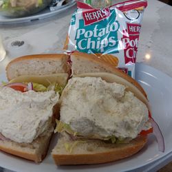 Cocco's Pizza - Mini Chicken Salad Sandwich. Comes with small bag of delicious chips!