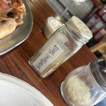 Gianni's Pizza - Cheese and vegan cheese shakers - Pizza Near Me - Oceanside, California Gianni's Pizza - Cheese and vegan cheese shakers - Pizza Near Me - Oceanside, California