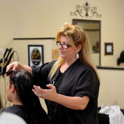 Bella Capelli Beauty Salon - Gina, owner of Bella Capelli Beauty Salon, specializing in everything Capelli (hair), doing what she does best!