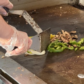 Penn Station East Coast Subs - Veggies getting grill treatment. - Cheesesteaks Near Me - Franklin, Tennessee