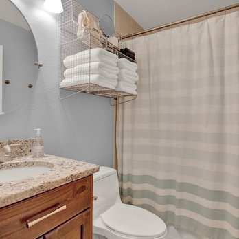 The Aqua Door - Full bathroom w/ tub/shower combo. - Guest Houses Near Me The Aqua Door - Full bathroom w/ tub/shower combo. - Guest Houses Near Me