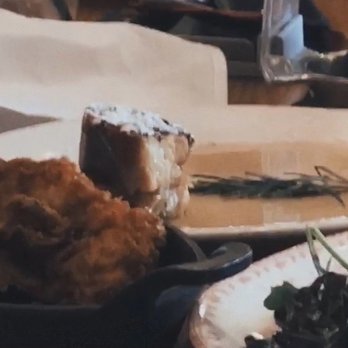 The Rustic - French toast plate with a branch of rosemary. Some may call this a war crime. - New American Near Me - Dallas, Texas