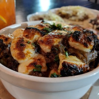 The State - Poutine. A must-try bowl of fries, gravy, braised short rib, and cheese curds. - Whiskey Bars Near Me - Rancho Cucamonga, California The State - Poutine. A must-try bowl of fries, gravy, braised short rib, and cheese curds. - Whiskey Bars Near Me - Rancho Cucamonga, California