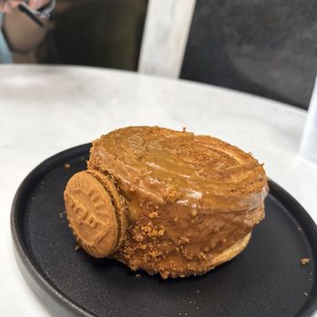 Fig and Olive Cafe - Cookie Butter Cronut. Filling seems to be cookie butter and cream cheese, very sweet but expertly balanced with the croissant exterior. - Desserts Near Me - Greensboro, North Carolina