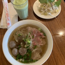 a bowl of soup and a plate of meatballs a bowl of soup and a plate of meatballs