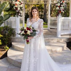 Simi Flowers and Gifts - The two floral swags and bride bouquet were beautiful, thank you!