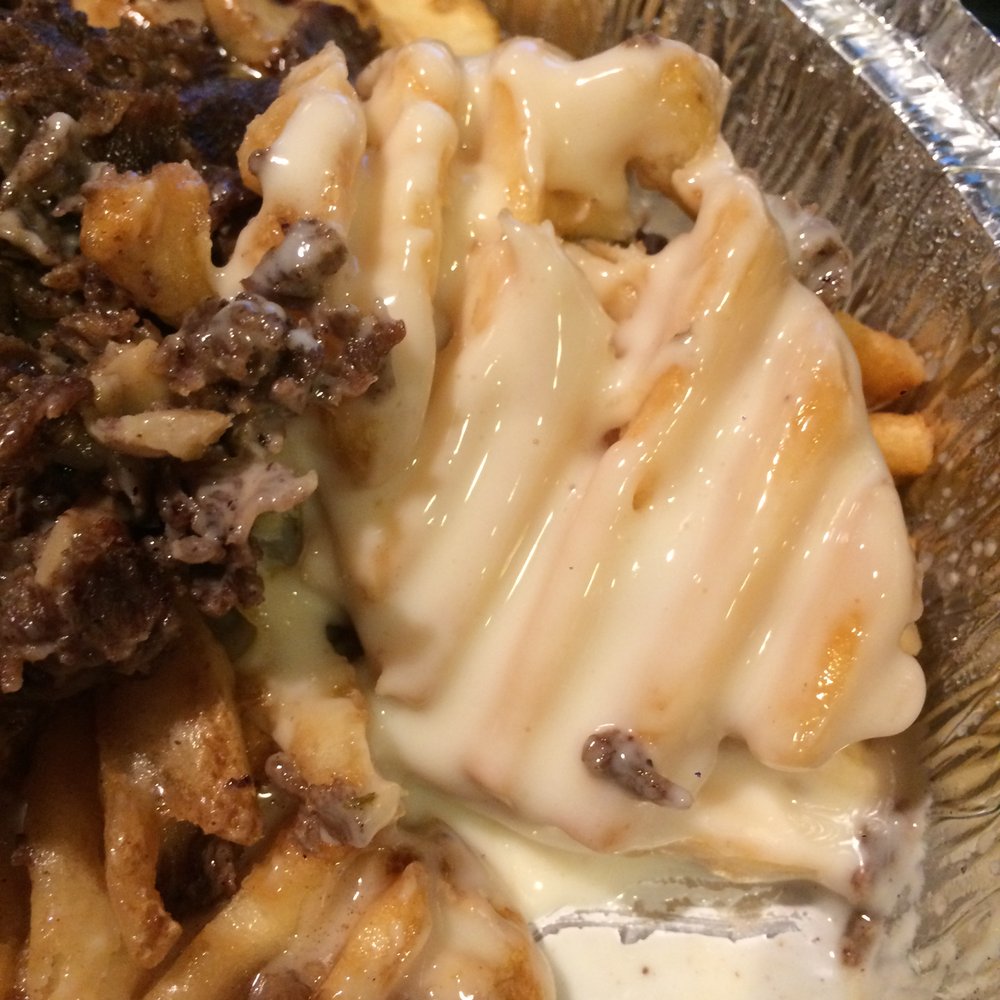 Manbroso's ToGo - waffle frie coated in cheese sauce - Chicken Wings Near Me - Aston, Pennsylvania Manbroso's ToGo - waffle frie coated in cheese sauce - Chicken Wings Near Me - Aston, Pennsylvania