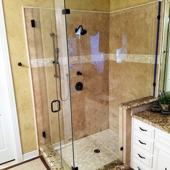 DFW Shower Shop - Travertine walls, mosaic shower floor & a custom frameless glass enclosure complete this beautiful master shower - General Contractors Near Me - Rowlett, Texas DFW Shower Shop - Travertine walls, mosaic shower floor & a custom frameless glass enclosure complete this beautiful master shower - General Contractors Near Me - Rowlett, Texas