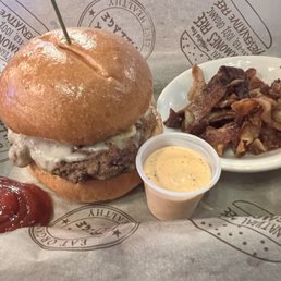 Bison Burger with onions and cheddar cheese Bison Burger with onions and cheddar cheese