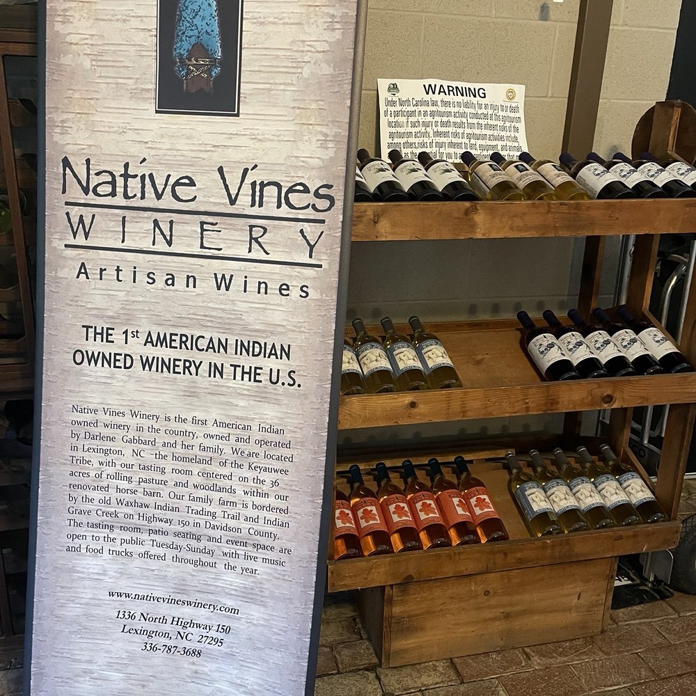 Native Vines Winery - Indoor tasting room with sign about the establishment - Wineries Near Me - Lexington, North Carolina Native Vines Winery - Indoor tasting room with sign about the establishment - Wineries Near Me - Lexington, North Carolina