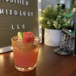Modified Mixology - CucumberWatermelon Mezcal Margarita with tajin rim