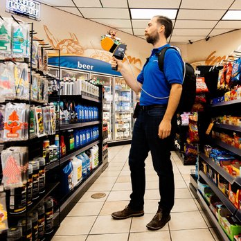 As-Builts - Precision Property Measurements - a man in a grocery store - General Contractors Near Me As-Builts - Precision Property Measurements - a man in a grocery store - General Contractors Near Me