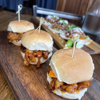 Project PUB - three sliders on a wooden cutting board - Beer Bar Near Me - Somerville, New Jersey