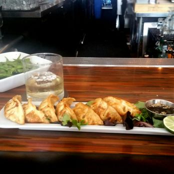 Far Bar - Crispy chicken dumplings and garlic butter edamame. Mmmmm. - Asian Fusion Near Me - Los Angeles, California Far Bar - Crispy chicken dumplings and garlic butter edamame. Mmmmm. - Asian Fusion Near Me - Los Angeles, California