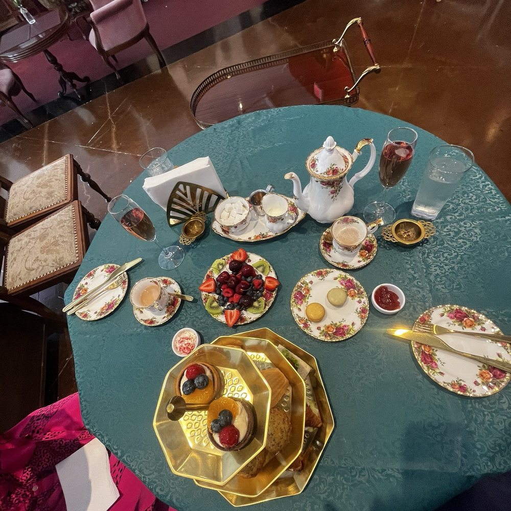 Antique Caffe - Another picture of the full tea. You can see more of the antique store in the background - Cafes Near Me - Johns Creek, Georgia