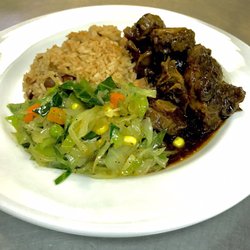Hot Pot Under De Tree - This was life right here oxtail with rice and peas and stem veggies