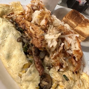 Marcia's Silver Spoon Cafe - Hood Canal Oyster Omelet with added bacon - Breakfast & Brunch Near Me - Tacoma, Washington Marcia's Silver Spoon Cafe - Hood Canal Oyster Omelet with added bacon - Breakfast & Brunch Near Me - Tacoma, Washington