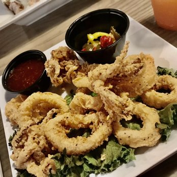 Caribbean Jack's - Calamari with teriyaki sauce. I asked for marinara sauce afterwards and peppers on side instead of on top - Caribbean Near Me - Daytona Beach, Florida Caribbean Jack's - Calamari with teriyaki sauce. I asked for marinara sauce afterwards and peppers on side instead of on top - Caribbean Near Me - Daytona Beach, Florida