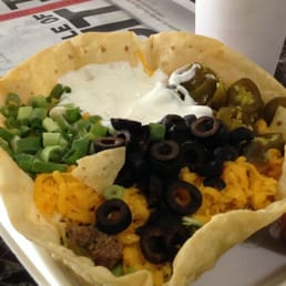 A WHOPPING 2 POUND+ TACO SALAD $7.75. It's a basic version but good price/value. A WHOPPING 2 POUND+ TACO SALAD $7.75. It's a basic version but good price/value.