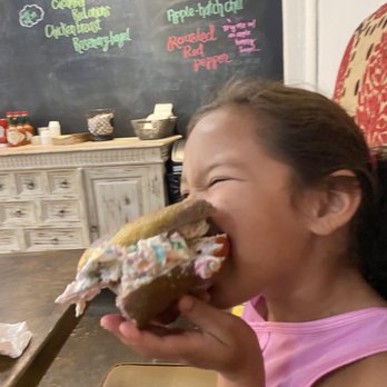 Boss Bagel - Massive birthday cake schmear on rainbow bagel - Coffee & Tea Near Me - San Antonio, Texas