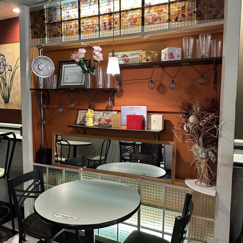 Cherry Pick Cafe - a table and chairs in a restaurant - Sandwiches Near Me - Los Angeles, California Cherry Pick Cafe - a table and chairs in a restaurant - Sandwiches Near Me - Los Angeles, California