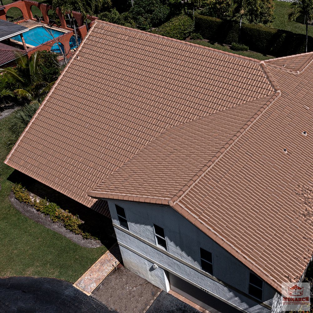 Slide of Monarch Roofing & Construction Inc.