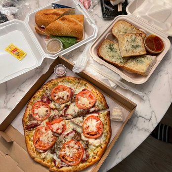 Amina Pizzeria - Cheese bread , pesto pizza with pepperoni and sausage, and Amina sub! All very good!!! - Pizza Near Me - Honolulu, Hawaii Amina Pizzeria - Cheese bread , pesto pizza with pepperoni and sausage, and Amina sub! All very good!!! - Pizza Near Me - Honolulu, Hawaii