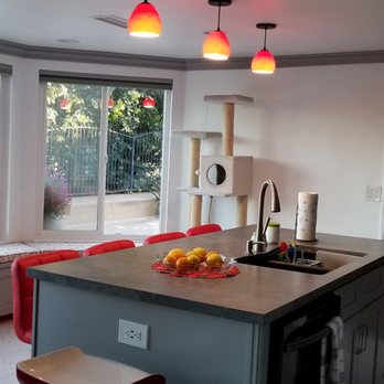 SPFX Kitchen Cabinets & Bath - Kitchen island with 3 pendant lights in the ceiling. - Kitchen & Bath Near Me - West Covina, California