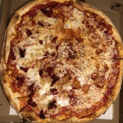 Woodbury Plaza - The pineapple dried tomato pizza with very few pineapple or dried tomato