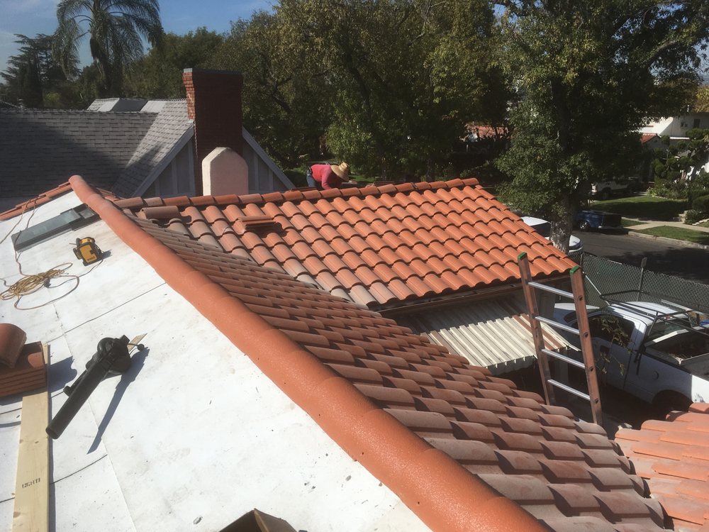 Slide of Lopez Roofing & Construction