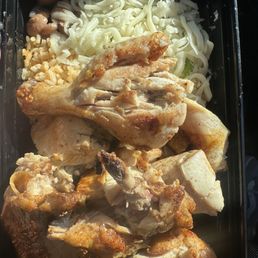 Halft a charbroiled chicken, rice, beans and cheese