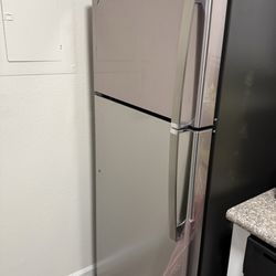 Appliances 4 Less - GE Refrigerator Delivered [The plastic wrap on the bottom was removed after delivery]