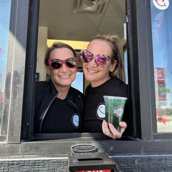 Scooter's Coffee - Amazing Store Manager, Angie, and the Owner, Shaina, holding a Blue Raspberry Scooot Energy Infusion. - Coffee & Tea Near Me - Burton, Michigan Scooter's Coffee - Amazing Store Manager, Angie, and the Owner, Shaina, holding a Blue Raspberry Scooot Energy Infusion. - Coffee & Tea Near Me - Burton, Michigan