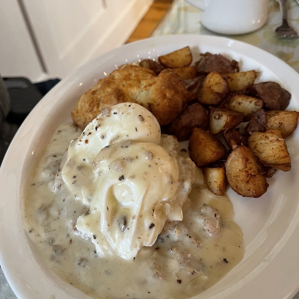The Cooked Goose - Biscuit with chicken sausage gravy, poached eggs and crispy home fries - Breakfast & Brunch Near Me - Westerly, Rhode Island The Cooked Goose - Biscuit with chicken sausage gravy, poached eggs and crispy home fries - Breakfast & Brunch Near Me - Westerly, Rhode Island