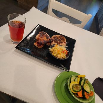 Cutlass Grille - Jerk chicken entree platter - Caribbean Near Me - Chesapeake, Virginia Cutlass Grille - Jerk chicken entree platter - Caribbean Near Me - Chesapeake, Virginia