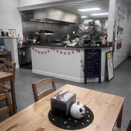the kitchen and dining area of a restaurant